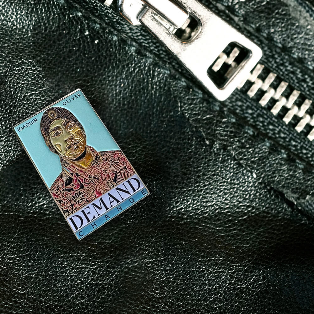 Joaquin 'GUAC' Oliver's "DEMAND CHANGE" Golden Enamel Pin