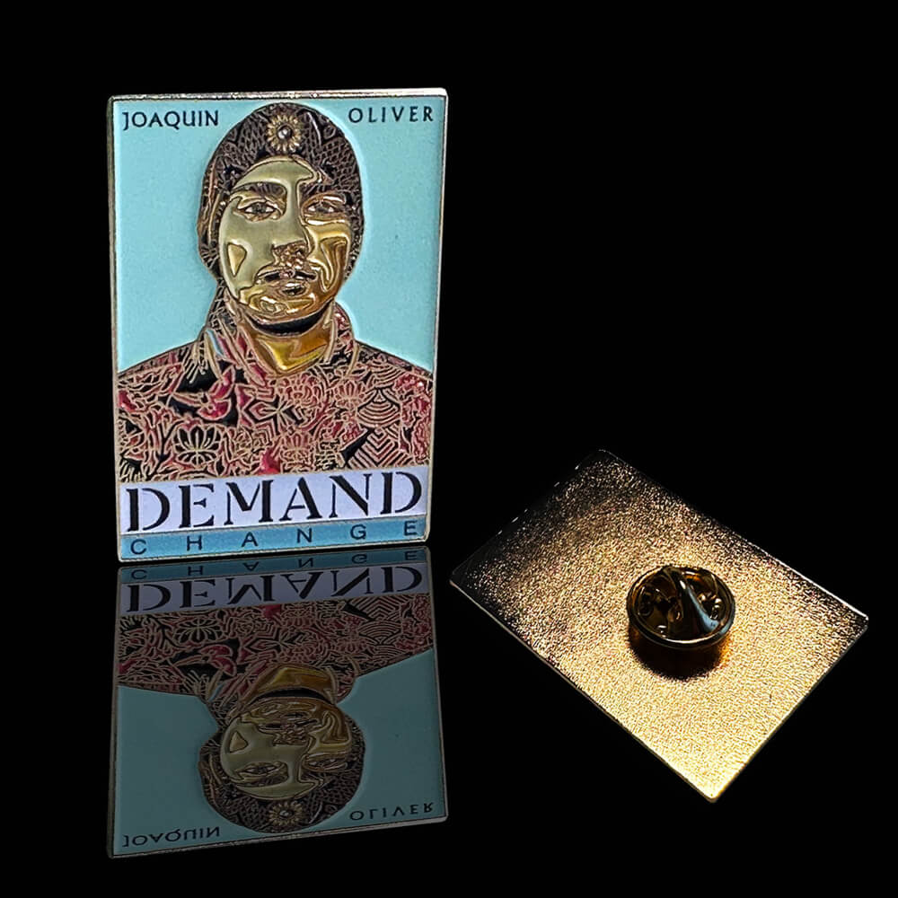 Joaquin 'GUAC' Oliver's "DEMAND CHANGE" Golden Enamel Pin